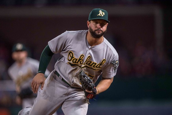 Injury Alert: A's First Baseman Yonder Alonso Leaves Game with Wrist Injury 