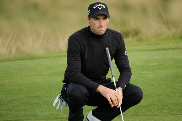 Oliver Wilson regains his form to lead at the Alfred Dunhill Links Championship.