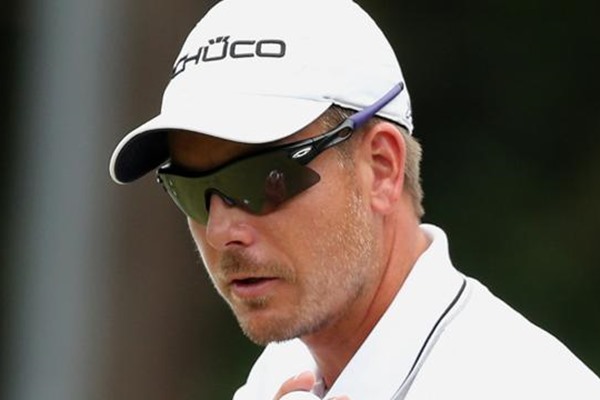 Victor Dubuisson pulls five shots clear of Ian Poulter in Turkey.