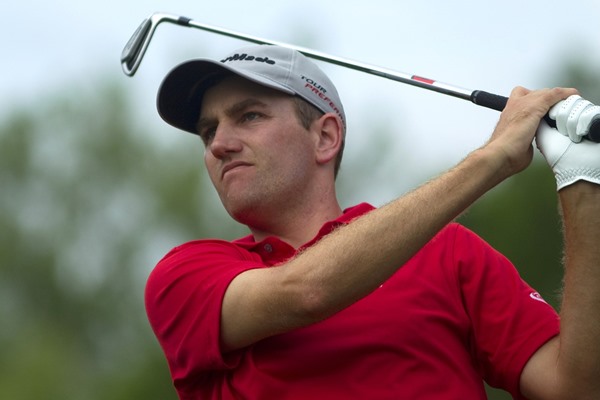 Who is Brendon Todd and Why is He Holding a Trophy?